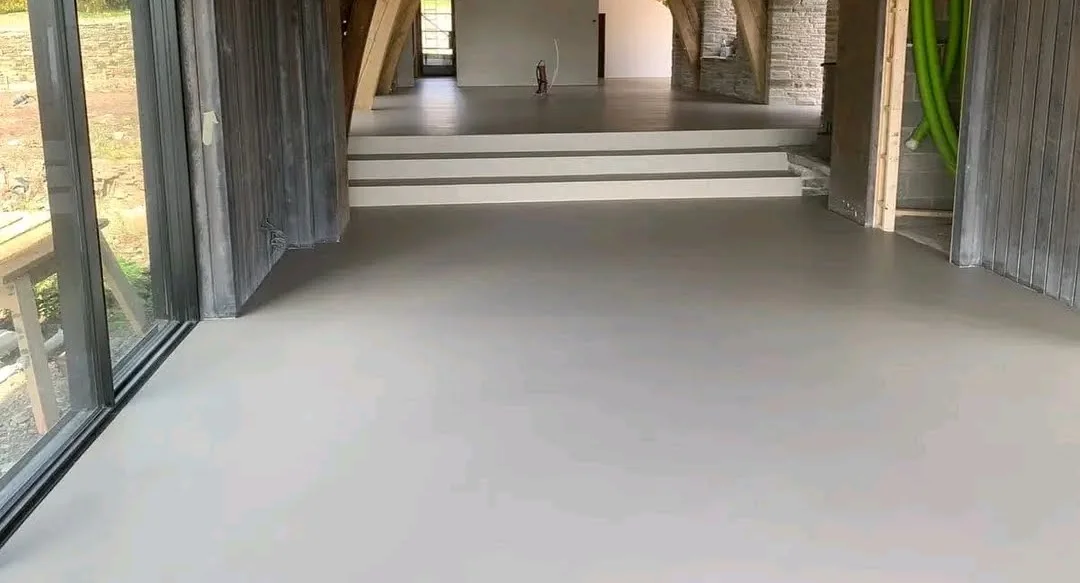 Smooth microtopping floor in a Kampala home — FloorCraft Uganda