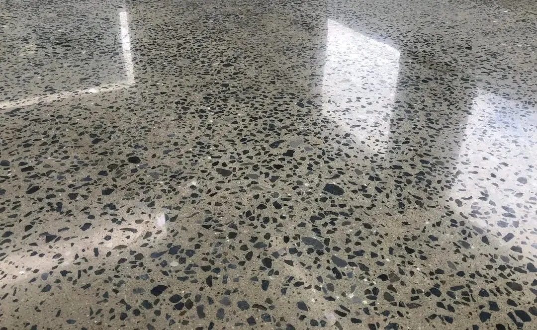 Traditional cement terrazzo floor with polished marble aggregate in Uganda