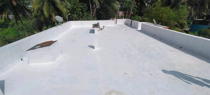 Waterproofing applied to a Uganda building rooftop — FloorCraft Uganda