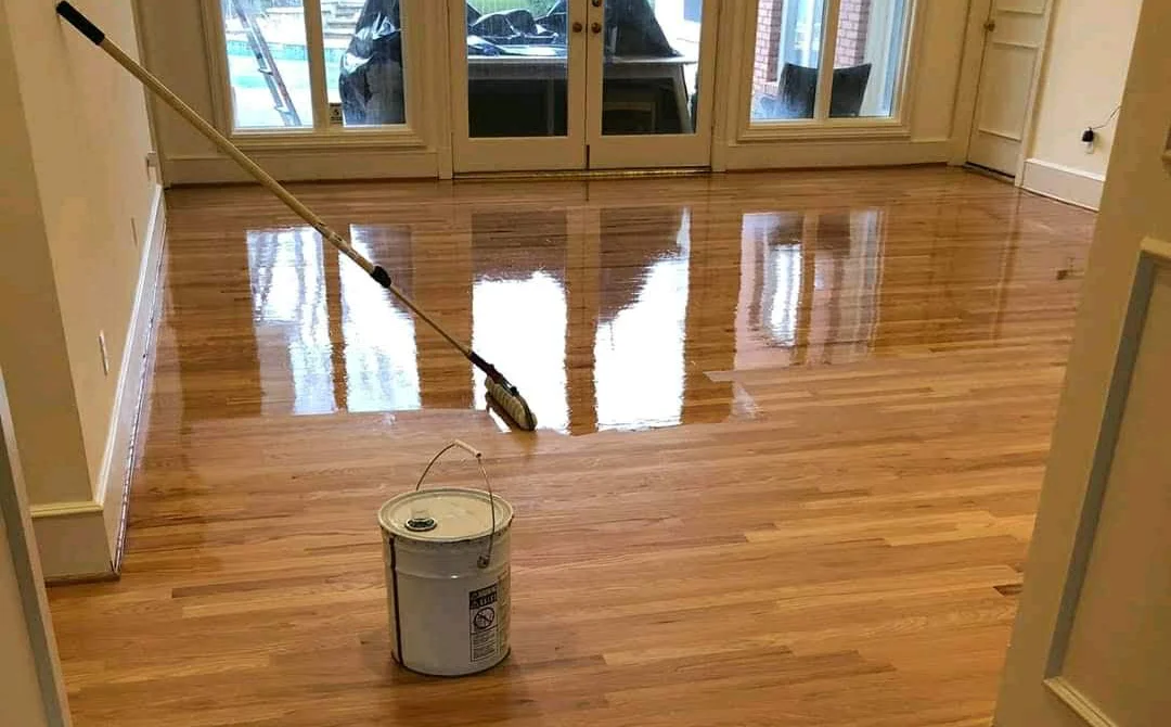 Hardwood floor with outdated finish before refinishing Uganda