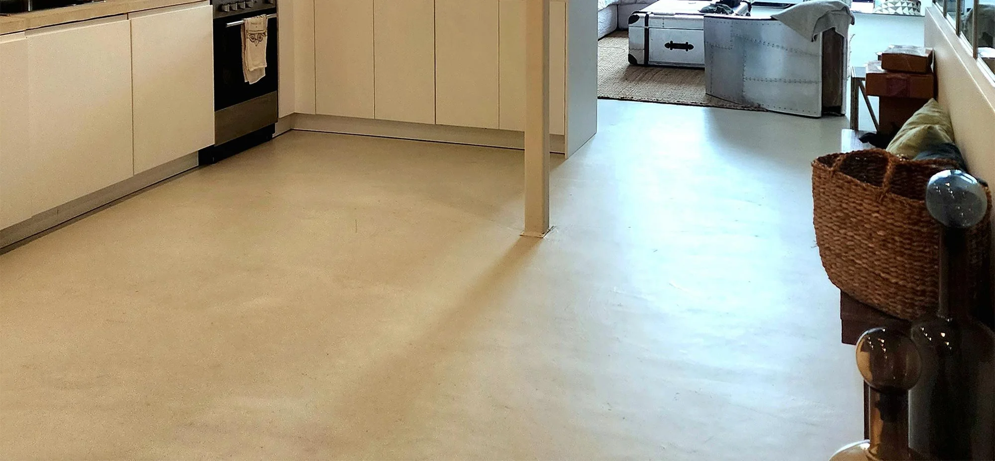 Microtopping living room floor in Uganda home