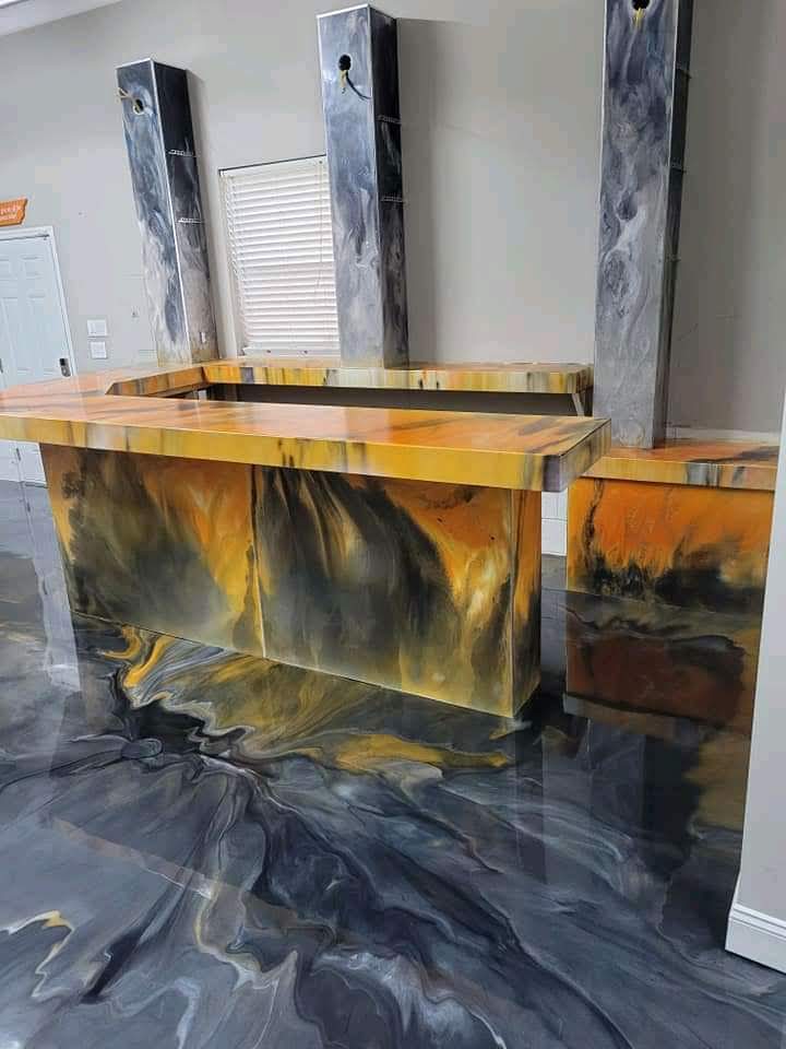 Glossy epoxy floor coating in a Uganda commercial building