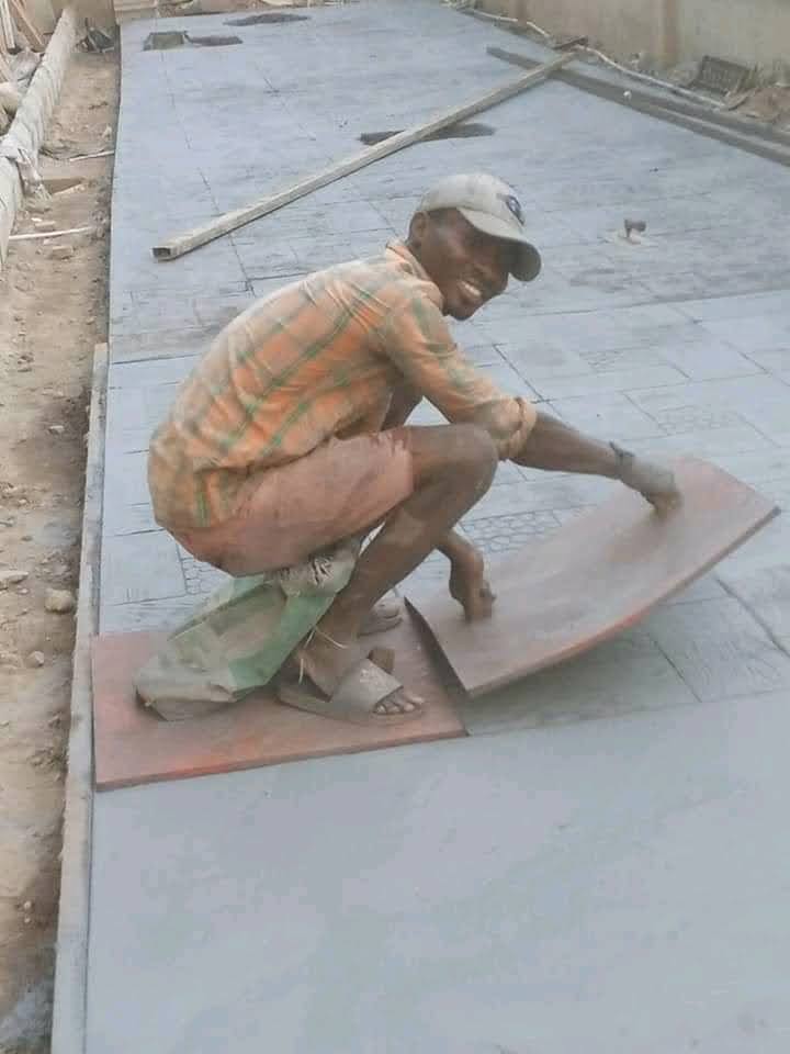 Faded stamped concrete patio before resealing Uganda