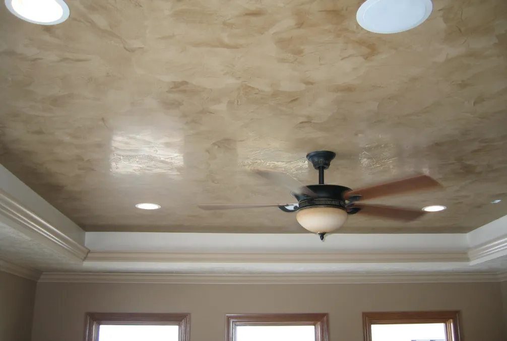 Venetian plaster wall finish with polished marble-effect texture in Uganda
