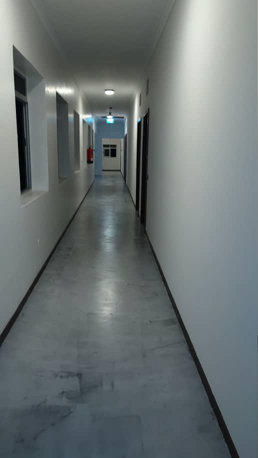 Microcement feature wall in a restaurant interior in Uganda